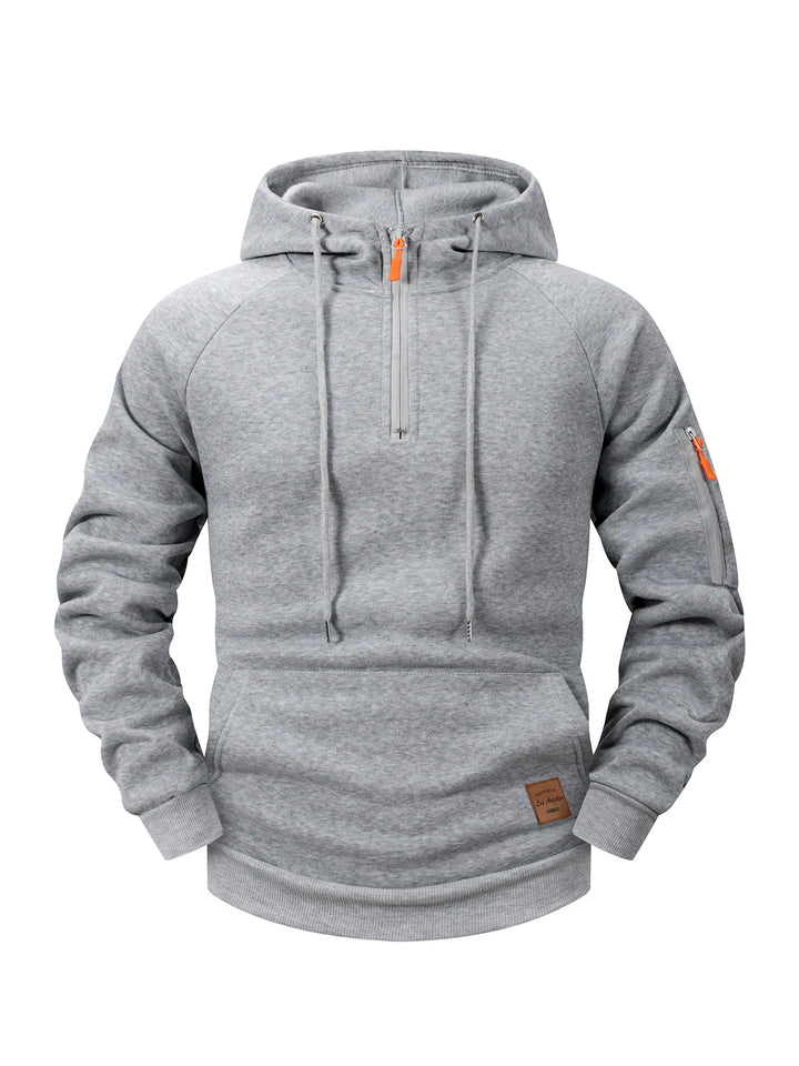 Gray fleece hoodie with a half-zip closure featuring an orange pull tab, ribbed cuffs, and hem.
